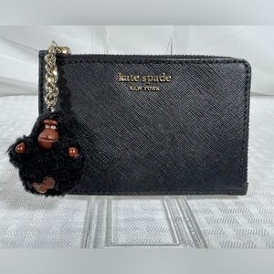 2081: Kate Spade Black Saffiano Leather Zip Cardholder Monkey Charm